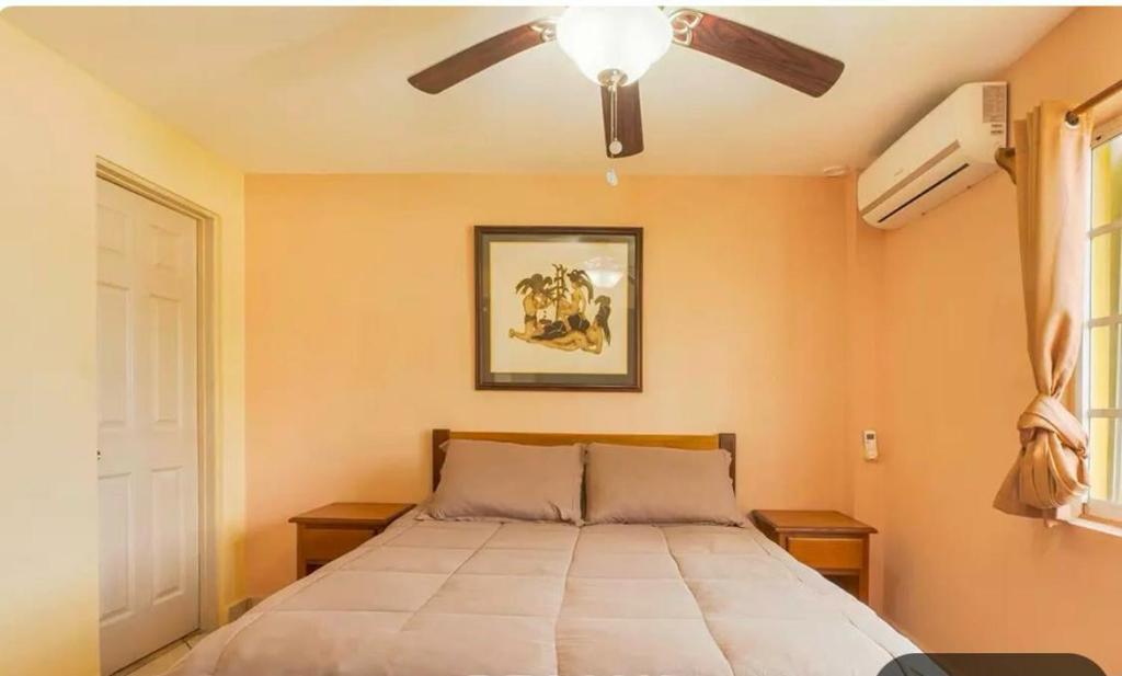 Giường trong phòng chung tại Paradise suites &residence