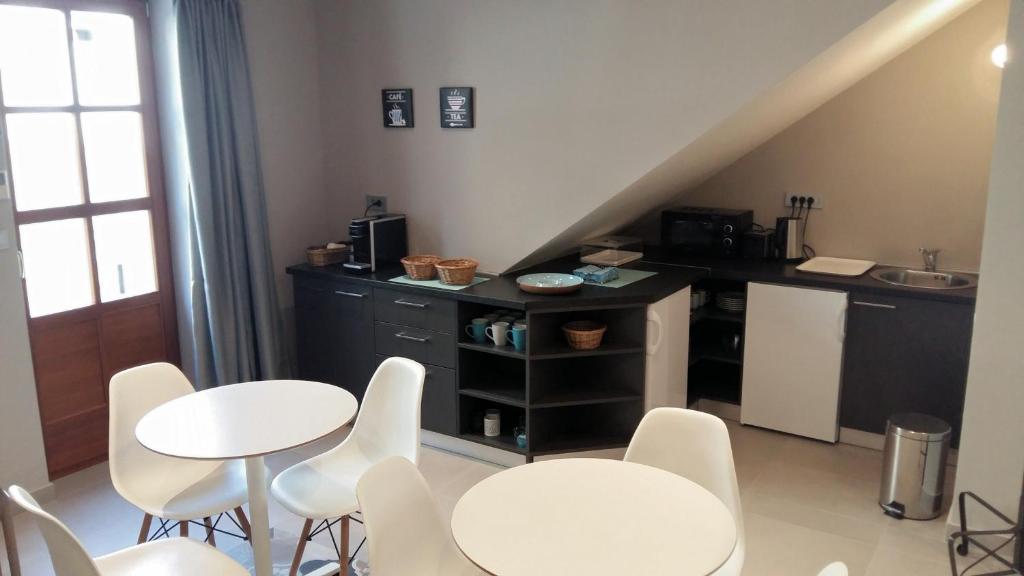 Kuchyňa alebo kuchynka v ubytovaní Hostel Dvor