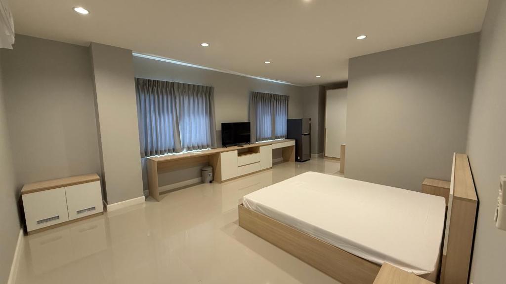 Postel nebo postele na pokoji v ubytování Nene Apartment