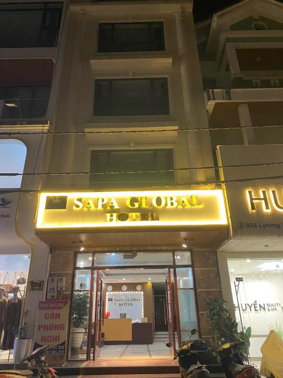 a store front of a building with a sign on it at SaPa Global Hotel in Sapa