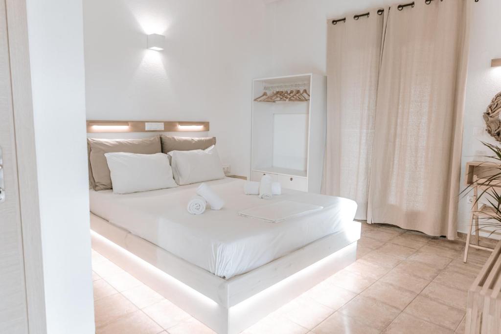 Ένα ή περισσότερα κρεβάτια σε δωμάτιο στο Villas Gemeli