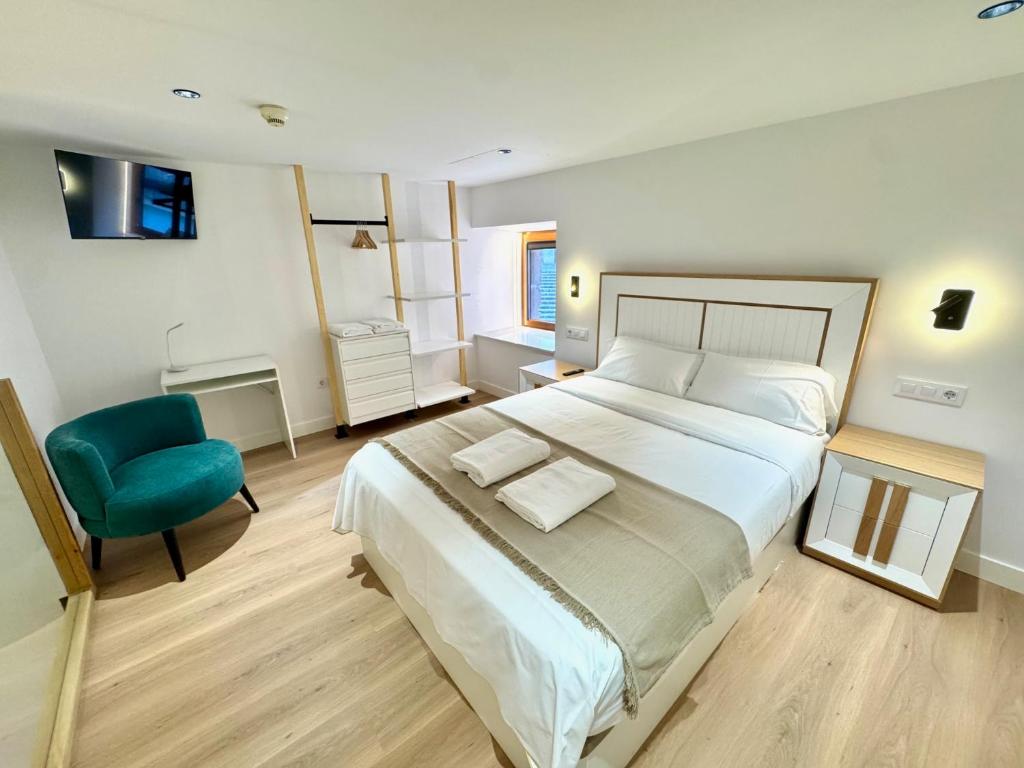 Ένα ή περισσότερα κρεβάτια σε δωμάτιο στο Premium Plaza San Cristóbal - Gran Vía Centro