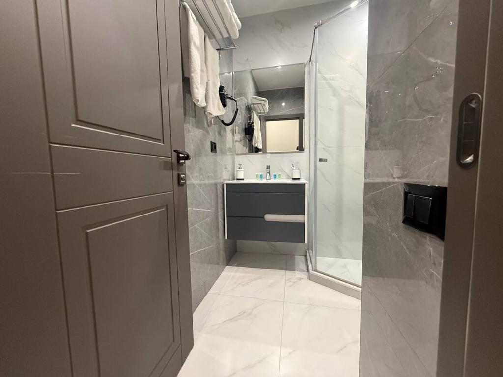 Ένα μπάνιο στο Апарт-отель Nine Rooms