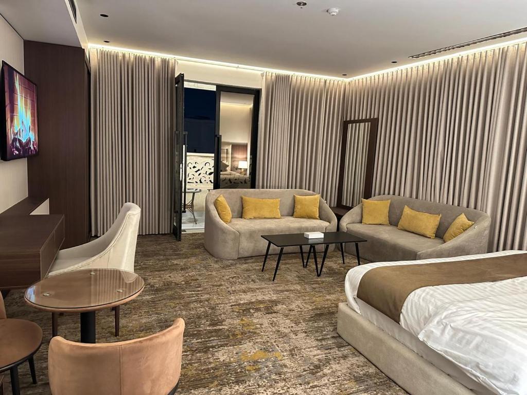 Χώρος καθιστικού στο Jawel Crown Hotel Apartments- تاج الجوهرة للشقق الفندقية