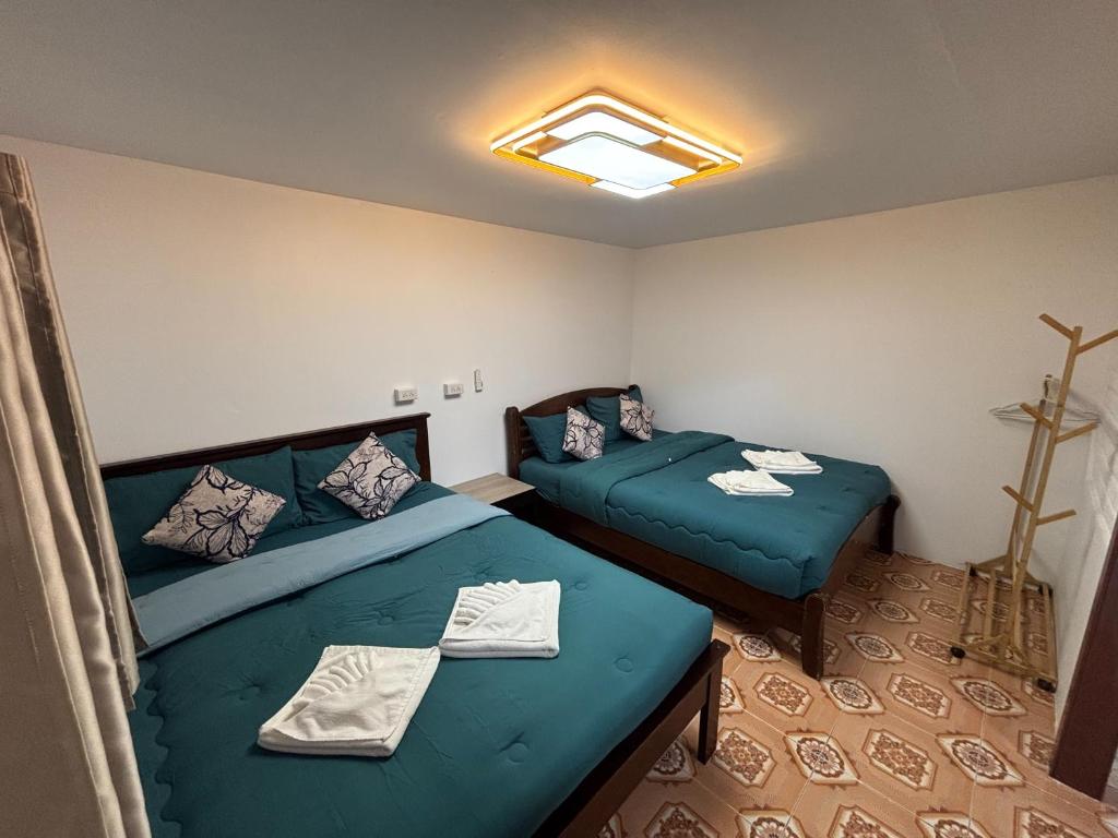 Ένα ή περισσότερα κρεβάτια σε δωμάτιο στο Alanta aonang resort