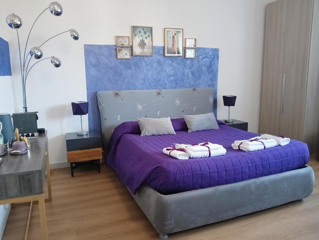 Una cama o camas en una habitación de Brà Guest House