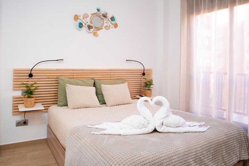 Postel nebo postele na pokoji v ubytování App Dichtbij vliegveld, Madrid centrum en IFEMA