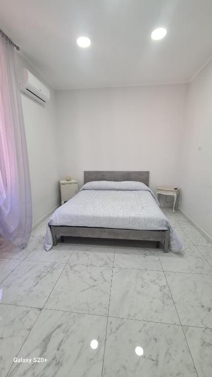 Ένα ή περισσότερα κρεβάτια σε δωμάτιο στο Sea House