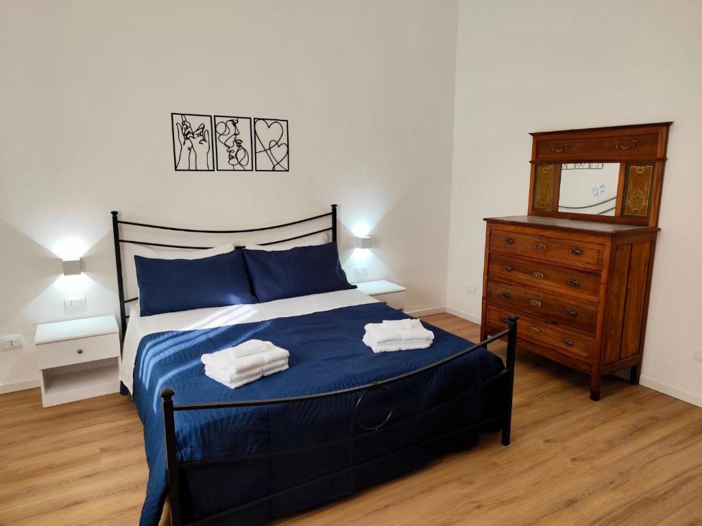 Ένα ή περισσότερα κρεβάτια σε δωμάτιο στο Civico 333