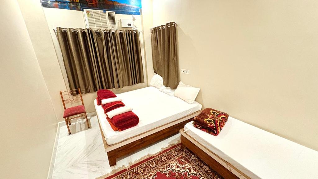 Postel nebo postele na pokoji v ubytování Kashi Vibes Hostel
