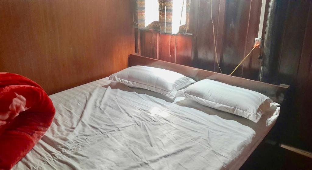 Ένα ή περισσότερα κρεβάτια σε δωμάτιο στο Mr Thành Homestay- paper village