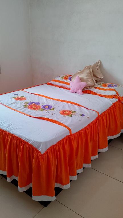 Ένα ή περισσότερα κρεβάτια σε δωμάτιο στο Lar Souzas