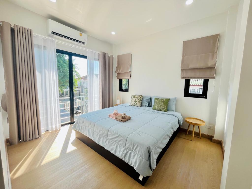 Ένα ή περισσότερα κρεβάτια σε δωμάτιο στο Private House near KKU