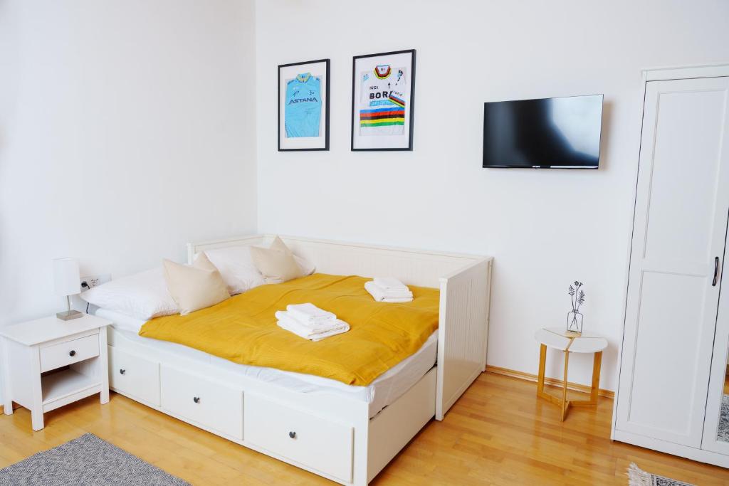 En eller flere senge i et værelse på Studio Tretlager