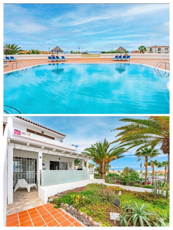 a large swimming pool next to a building at APARTMENT IN AMARILLA GOLF 2 bedrooms in San Miguel de Abona