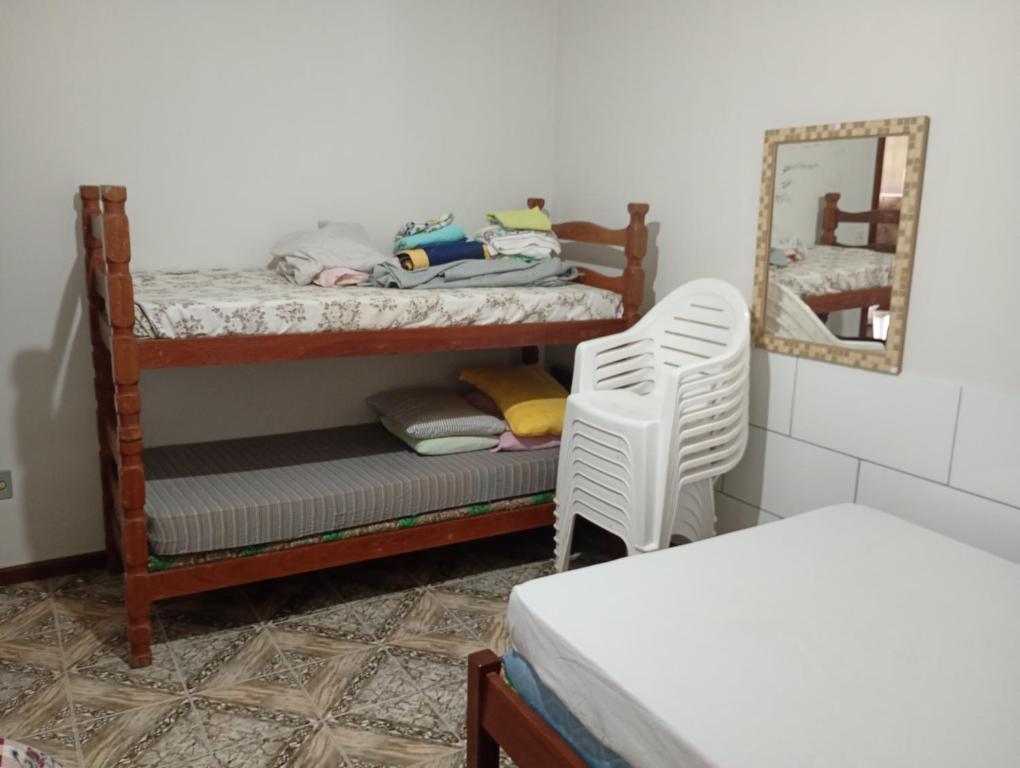 Ένα ή περισσότερα κρεβάτια σε δωμάτιο στο Casa da Márcia