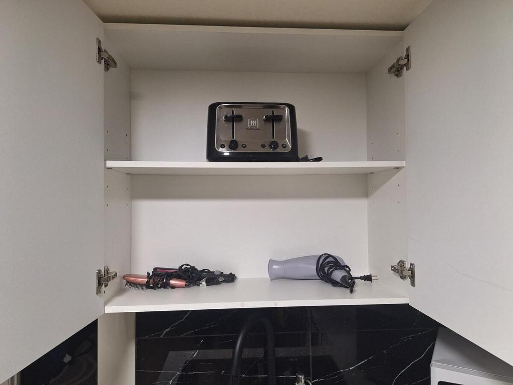 TV/trung tâm giải trí tại Roj exclusive comfort home