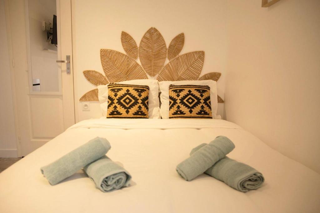 Ένα ή περισσότερα κρεβάτια σε δωμάτιο στο Résidence Zénith