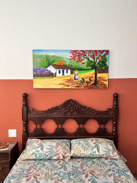 Ένα ή περισσότερα κρεβάτια σε δωμάτιο στο Apartamento com Ar no centro de BH