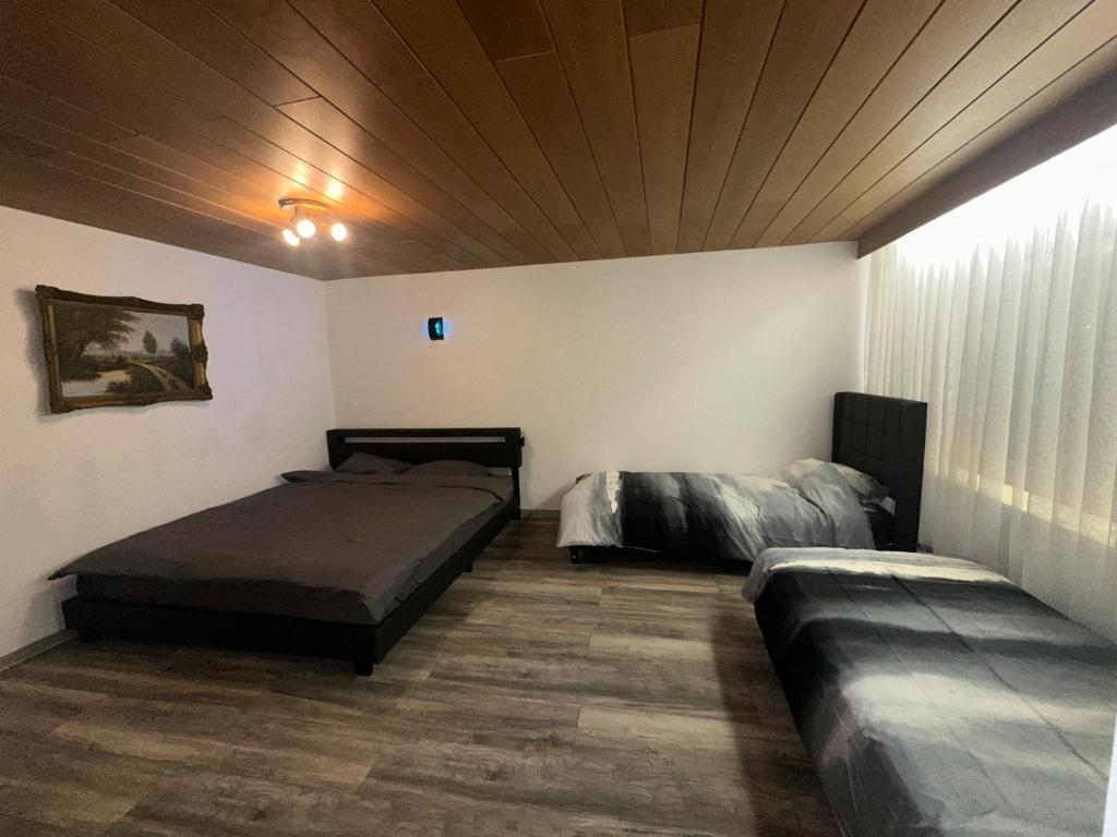 Ένα ή περισσότερα κρεβάτια σε δωμάτιο στο Holiday Oasis 2 near Legoland Deutschland