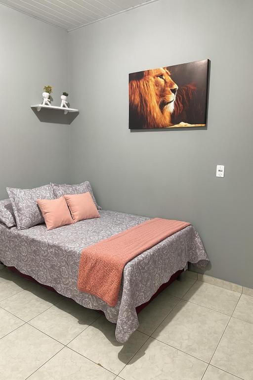 Una cama o camas en una habitación de Apto no centro de Belém Nos altos