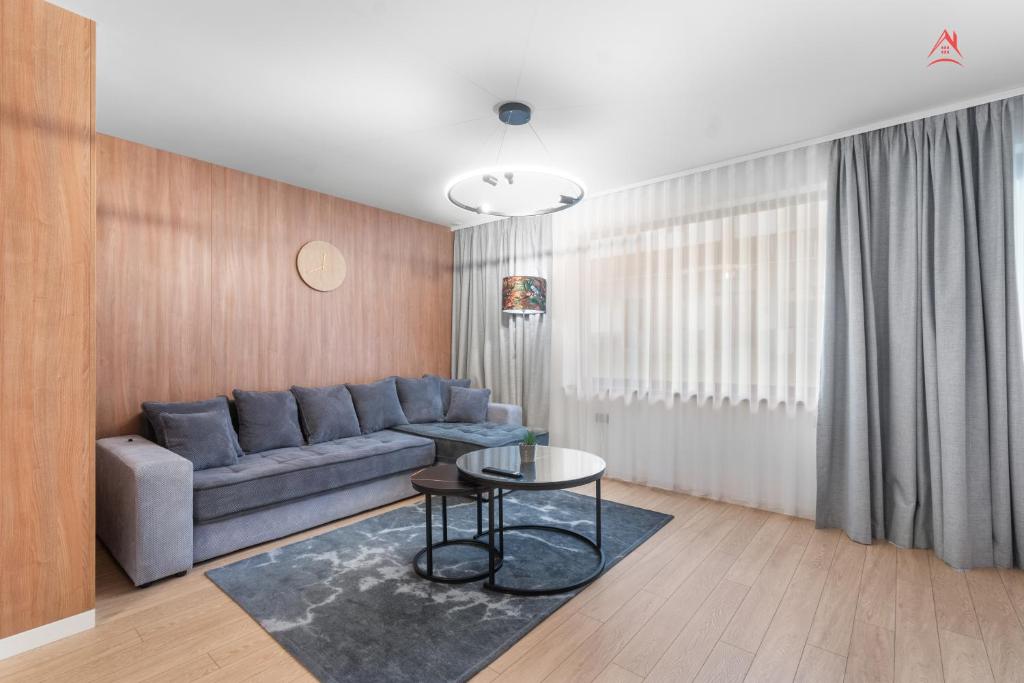 Posezení v ubytování Sunny Grand Chalet Apartment