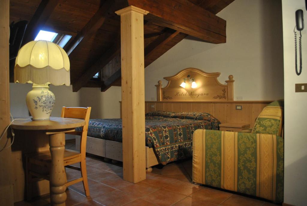 Postel nebo postele na pokoji v ubytování Hotel Niagara