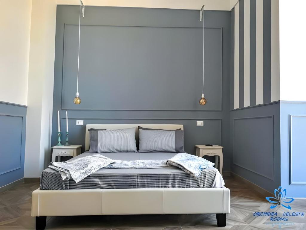 Ένα ή περισσότερα κρεβάτια σε δωμάτιο στο Orchidea Celeste Bed and Breakfast