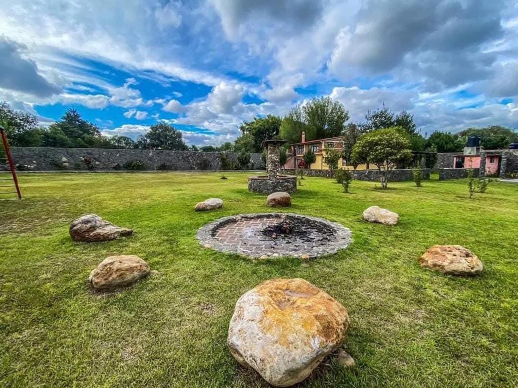 Κήπος έξω από το Casa de Campo y Cabañas los Angeles