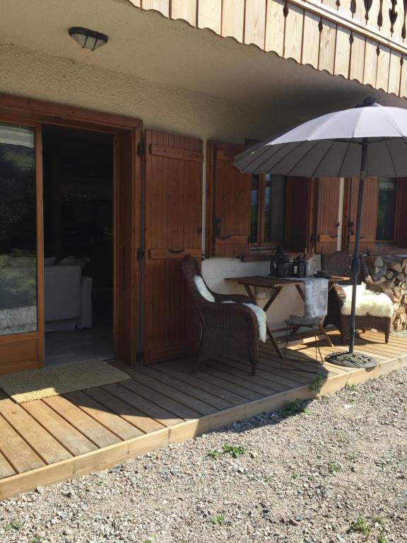 Patio nebo venkovní prostory v ubytování L'Ours Blanc Lodge