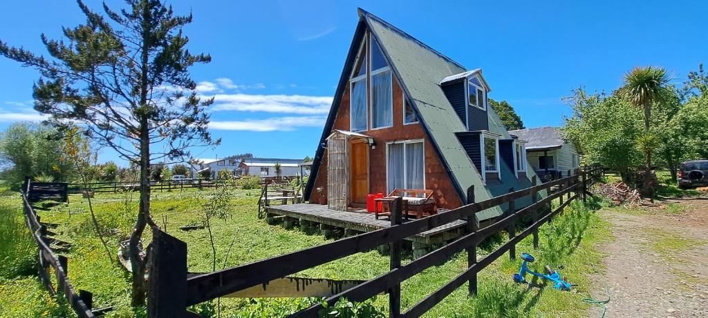 Κήπος έξω από το Cabaña el bosque de la bruja