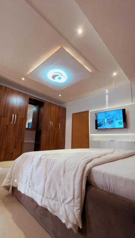 Ένα ή περισσότερα κρεβάτια σε δωμάτιο στο Swanky Spaces