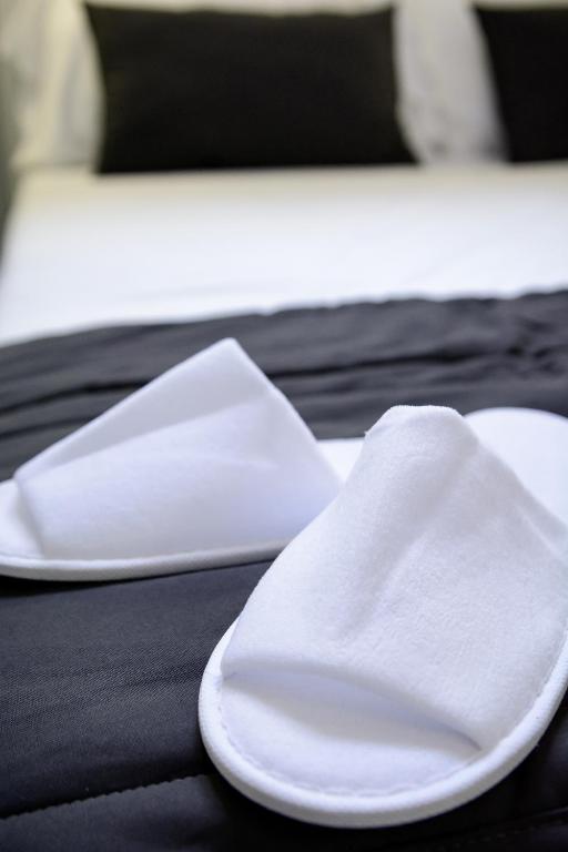 Posteľ alebo postele v izbe v ubytovaní B&B al Palazzo