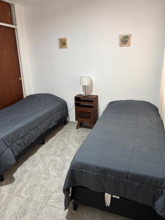 Ένα ή περισσότερα κρεβάτια σε δωμάτιο στο Apartamento 2 dormitorios