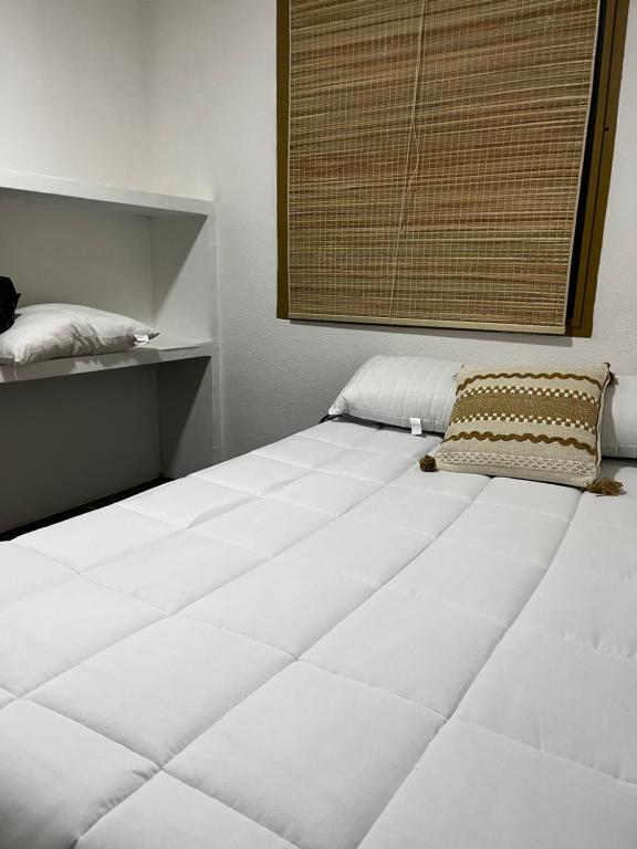 Ένα ή περισσότερα κρεβάτια σε δωμάτιο στο Posada las vegas