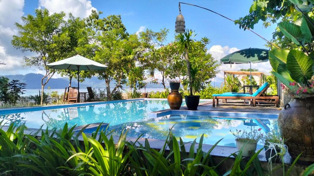 Πισίνα στο ή κοντά στο Rumah Arunika 27