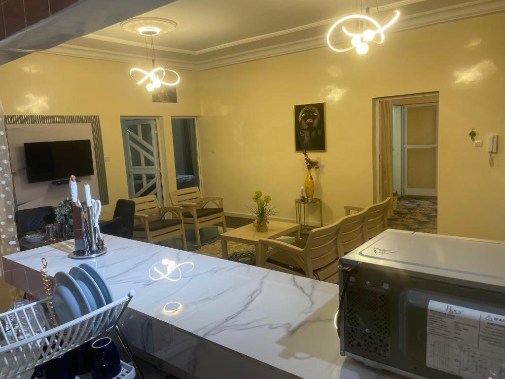 TV a/nebo společenská místnost v ubytování La Voile dor