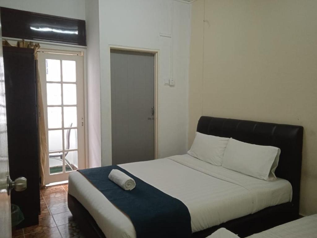 Ένα ή περισσότερα κρεβάτια σε δωμάτιο στο Rest N Go CH