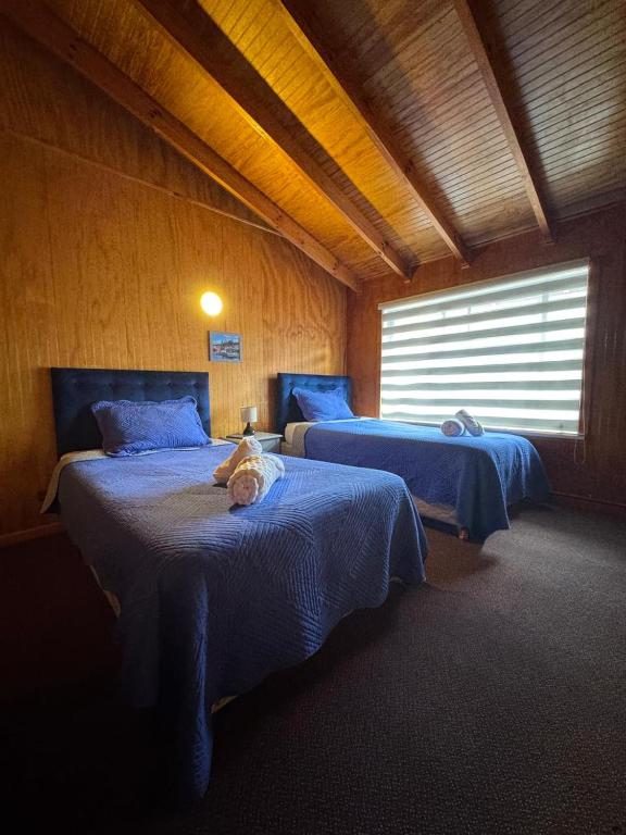 Ένα ή περισσότερα κρεβάτια σε δωμάτιο στο Hotel Gran Luna