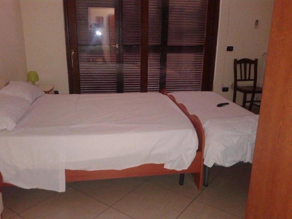 Posteľ alebo postele v izbe v ubytovaní Green House