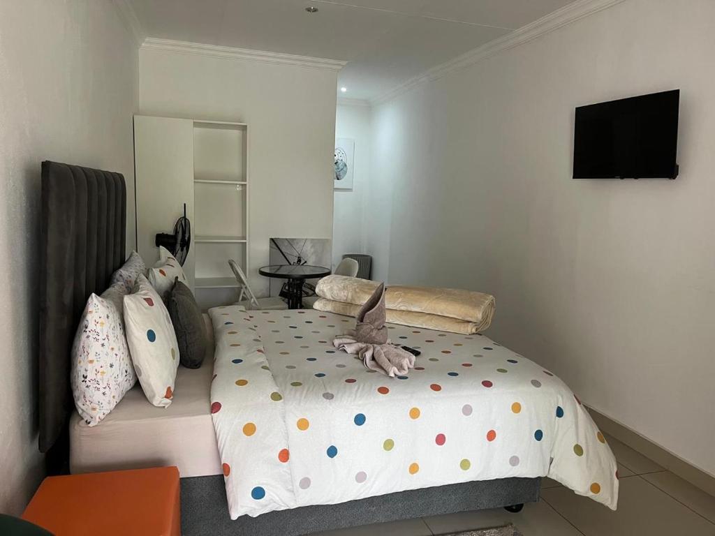 Ένα ή περισσότερα κρεβάτια σε δωμάτιο στο StayAT62