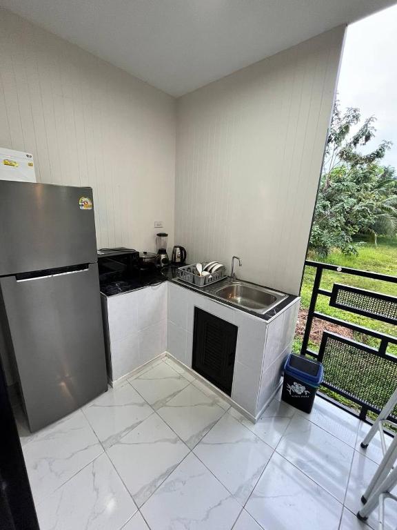 Kuchyň nebo kuchyňský kout v ubytování B Residence