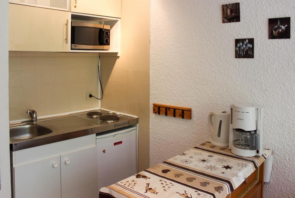 Kuchyň nebo kuchyňský kout v ubytování Serac Appartements VTI