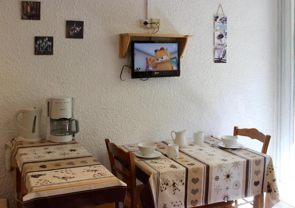TV a/nebo společenská místnost v ubytování Serac Appartements VTI
