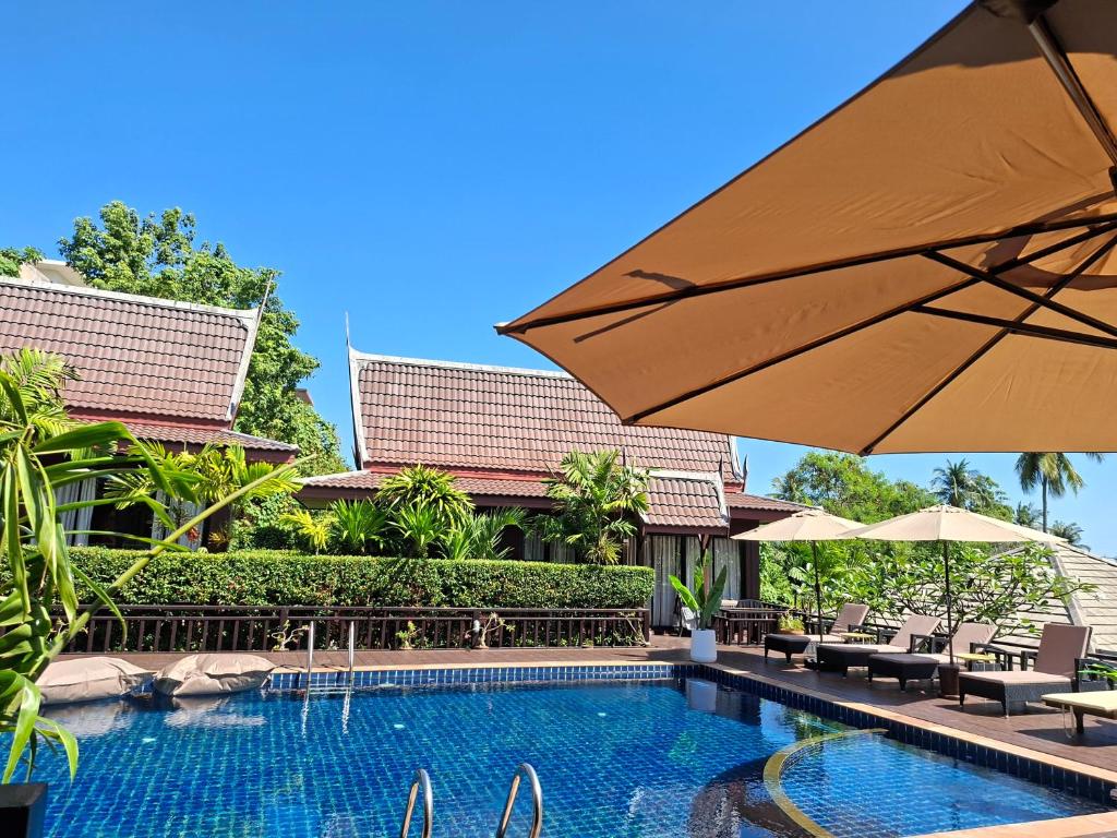 Bazén v ubytování Kaya Mani Villas nebo v jeho okolí