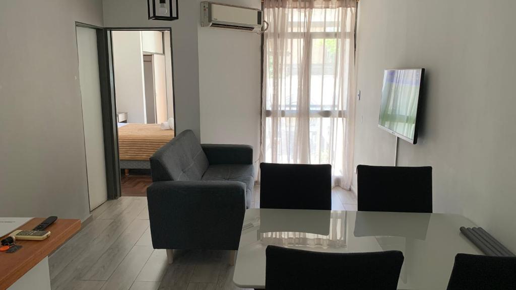 TV a/nebo společenská místnost v ubytování Depto con Terraza Privada - Cerca De Todo