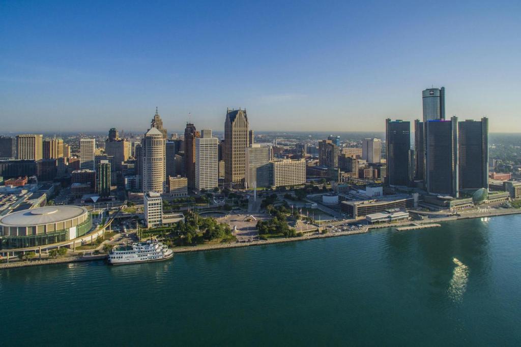 an aerial view of a city with a body of water at Detroit Marriott at the Renaissance Center in Detroit