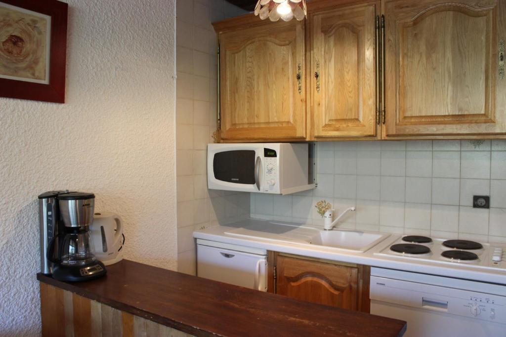Kuchyň nebo kuchyňský kout v ubytování Serac Appartements VTI