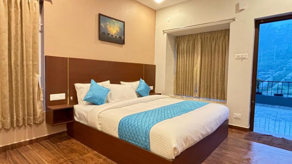 Giường trong phòng chung tại Hotel Park Land