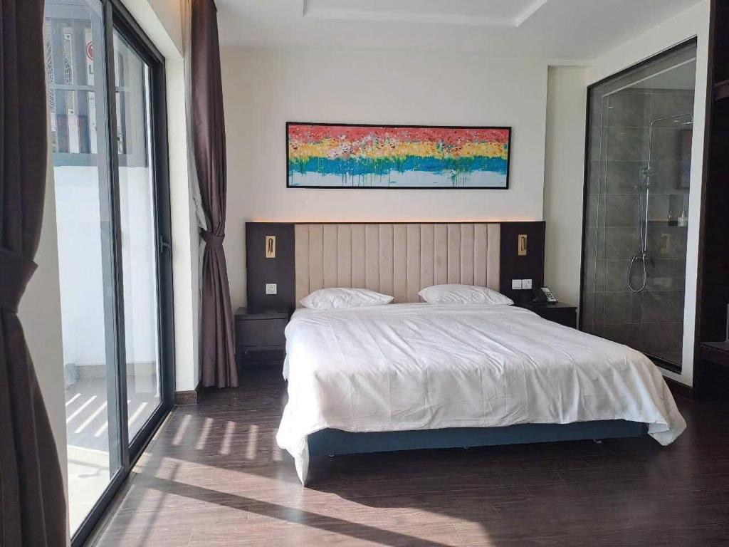 En eller flere senge i et værelse på Shaphire